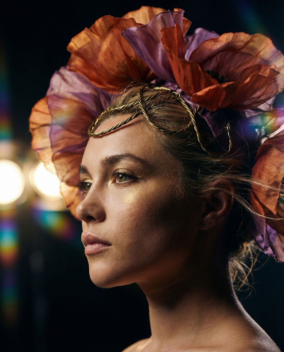 鎏金罂粟下的侧影神谕